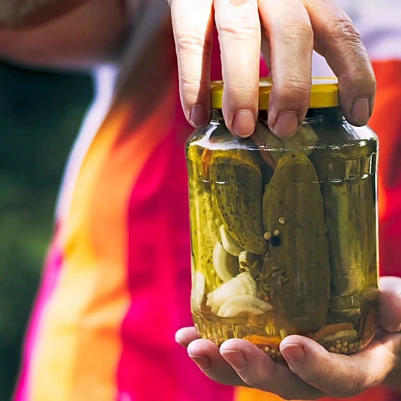 She Turns A Glass Pickle Jar Into A Charming Pendant Light For Your Porch