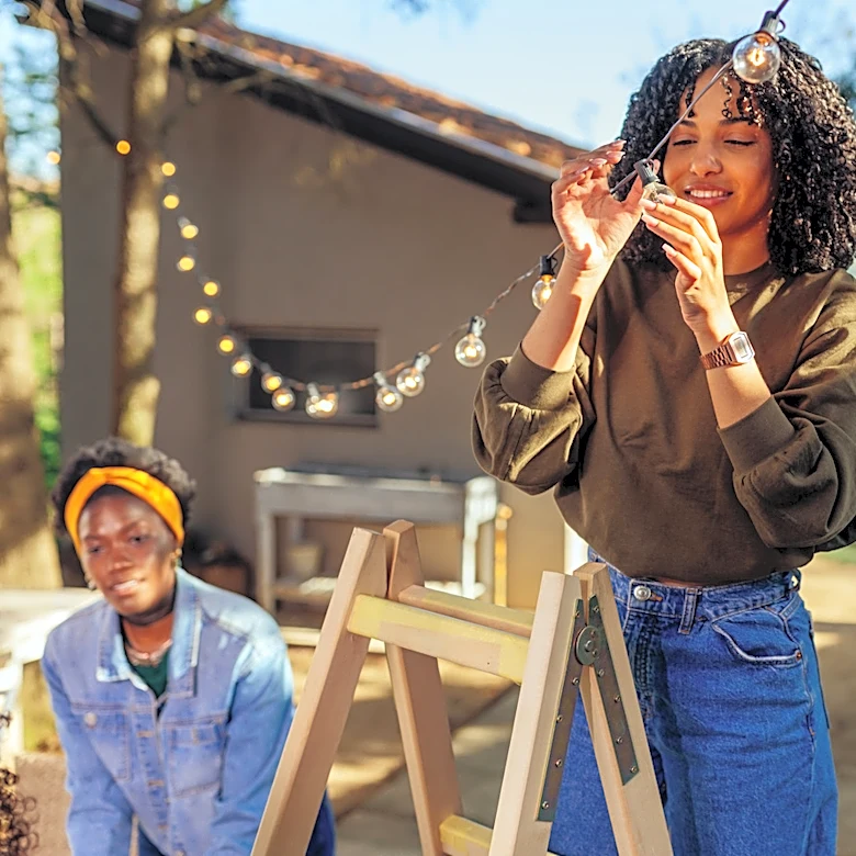 Give Your Patio String Lights Spooky, '90s-Inspired Charm With Plastic Pumpkins
