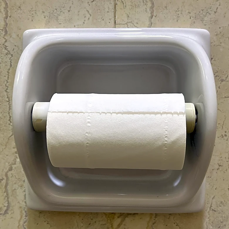Not Just For Bathrooms: Turn Toilet Paper Holders Into Useful Kitchen Sink Storage