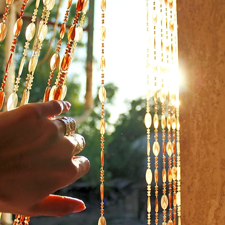 Use Simple Binder Rings To DIY The Coolest Beaded Curtains