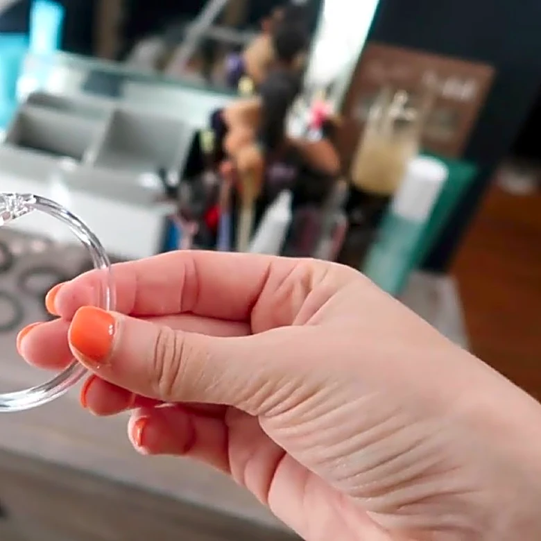 The Dollar Tree DIY That Creates Countertop Storage From Shower Curtain Rings