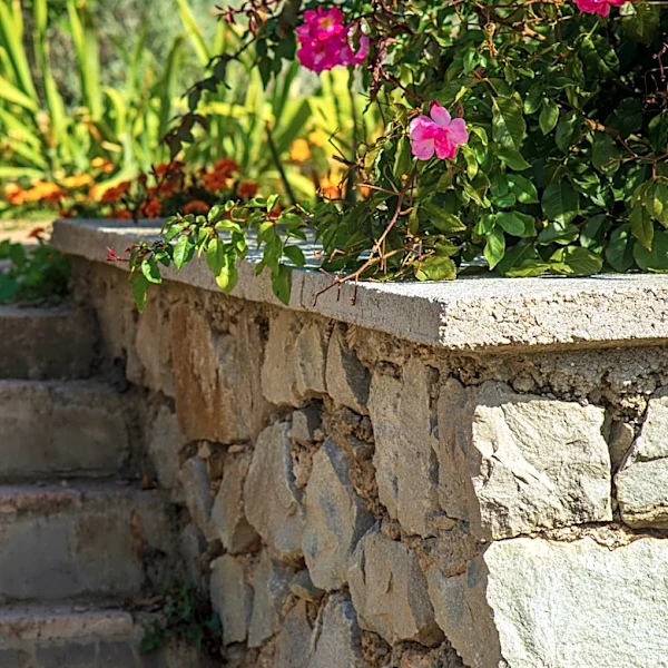 Skip The Basic Concrete Blocks: The Natural Stone For Retaining Walls That Adds A Rustic Touch