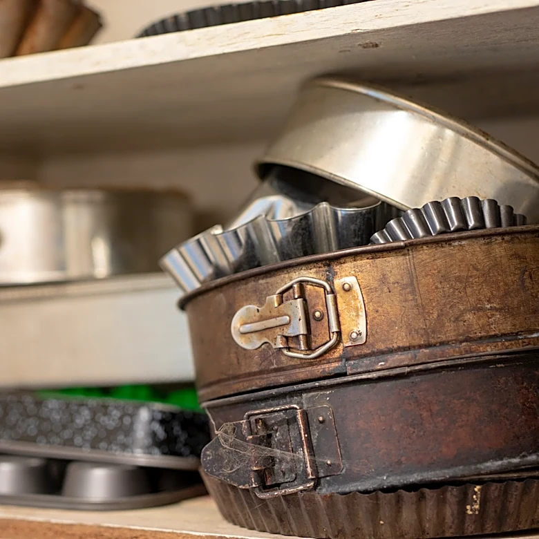 A Rustic DIY: Use Old Cake Pans To Keep Counters Organized And Stylish