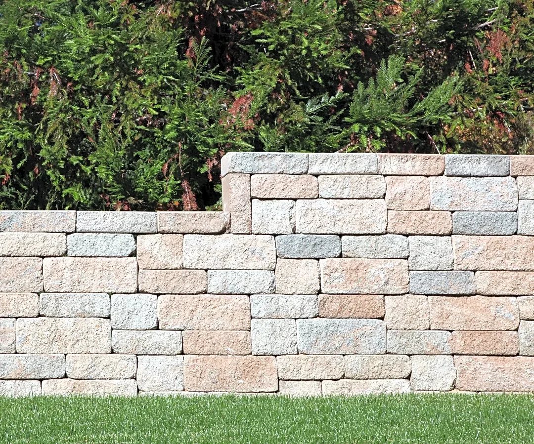 He Turns A Retaining Wall Into A Functional Entertaining Space With This Genius DIY