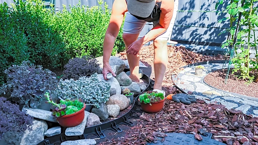 Keep Weeds Out Of Your Shaded Garden Beds With A Polished Stone That Looks Sleek