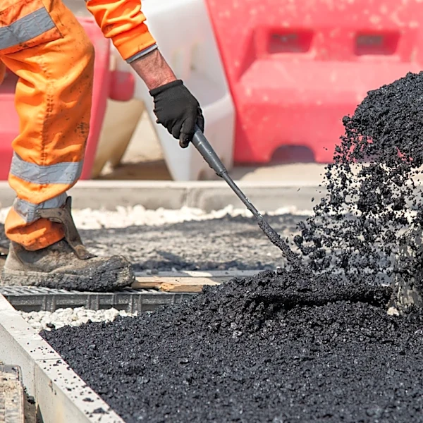 The Unexpected Ingredient That Gives Asphalt Its Black Color And Sticky Texture