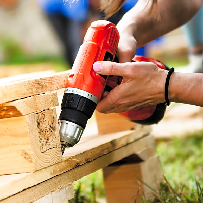 Man Turns Old Wood Pallets Into A Mini Cabin With An Impressive DIY