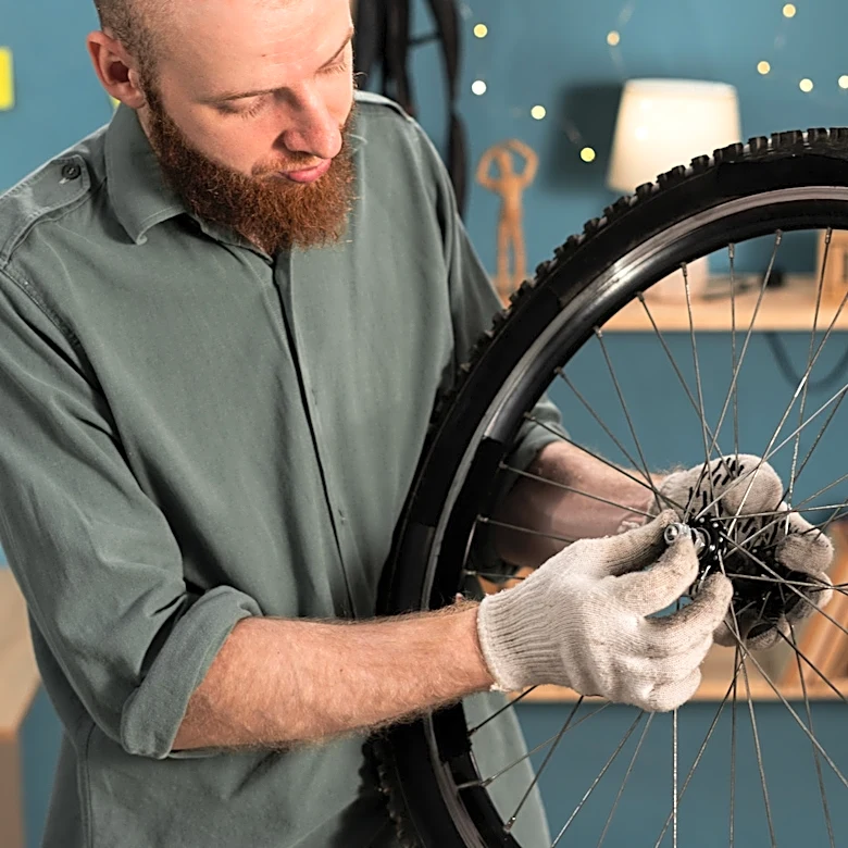 Stop Tossing Old Bike Wheels: Make Rustic Wall Storage Shelves Instead