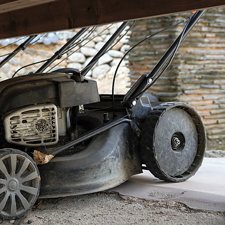 She Builds A Simple Table That Keeps Her Lawn Mower Stored Away