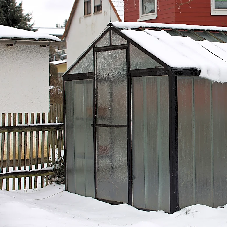 Forget Pricey Heaters: Warm Your Greenhouse In Winter For Free With Something You Already Have