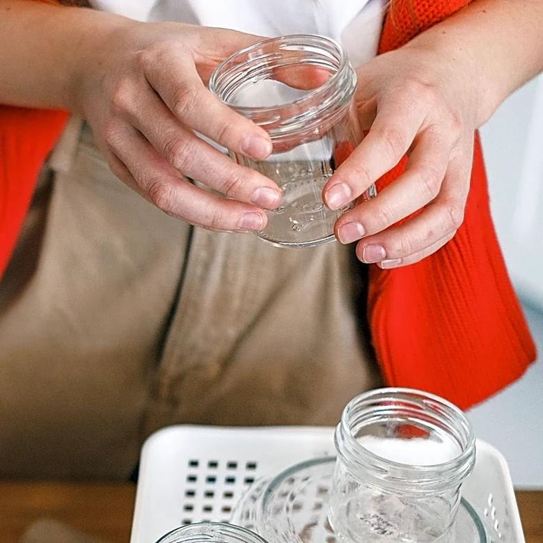 Use Glass Jars To Make A Handy Tool For Hanging Things On The Wall