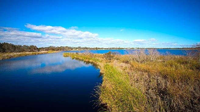 Alabama's Under-The-Radar Gulf Coast Lake Is A Fishing, Kayaking, And Swimming Paradise With White Sand Beaches