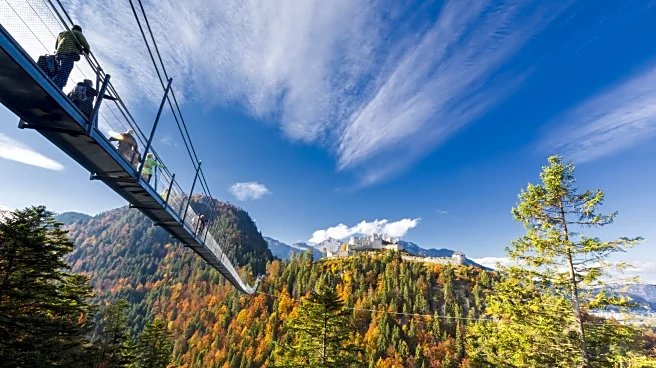 High In The Austrian Alps Is A Picturesque Town With A Dizzying Suspension Footbridge To A Castle