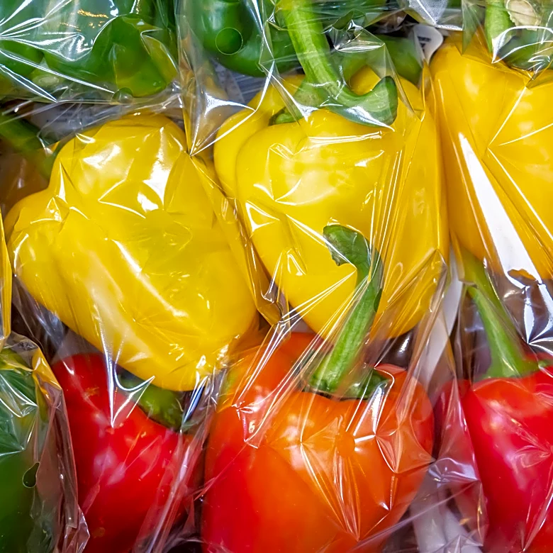 Why You'll Sometimes See Bell Peppers Sold In Packages