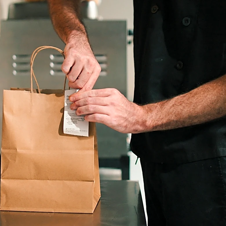 Should You Tip On Takeout (And, If So, How Much)?