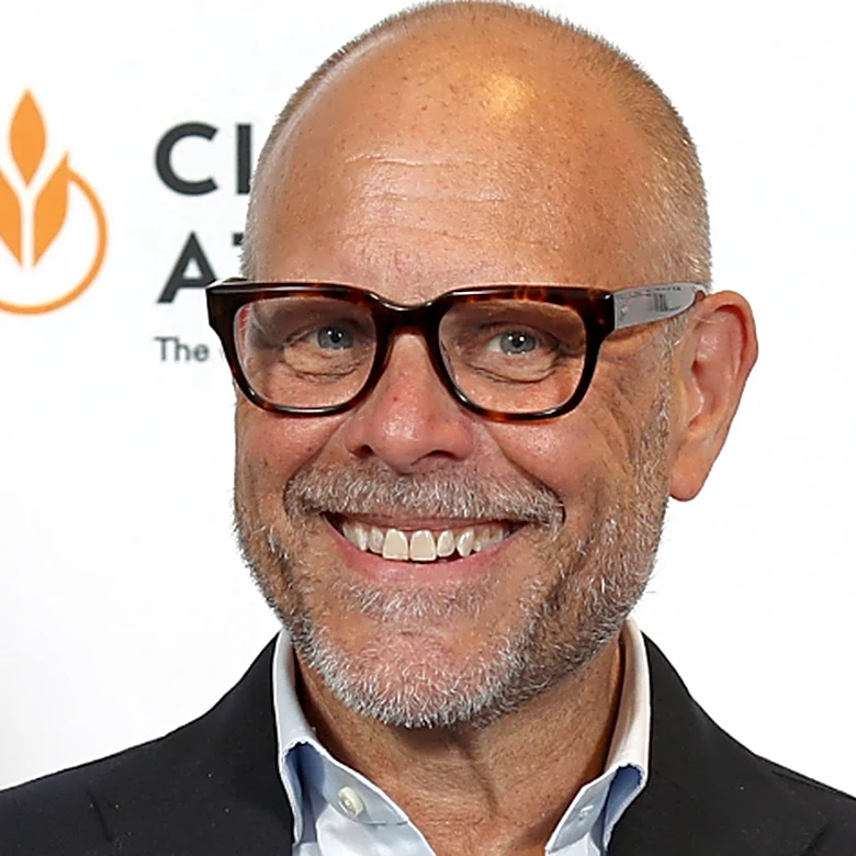 Alton Brown Says His Last Meal Needs Fries Prepared With This Controversial Ingredient