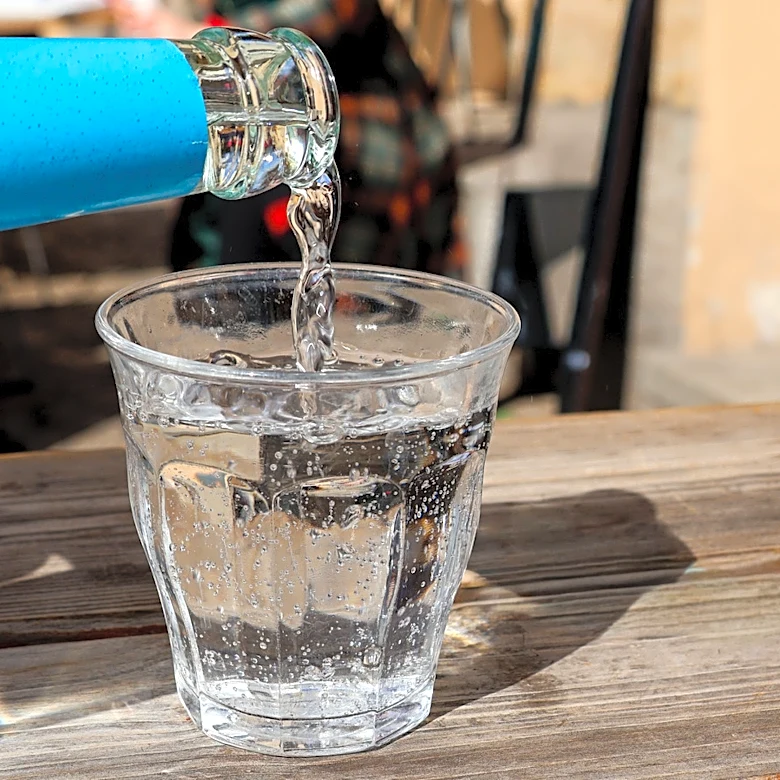 Why Coffee In Italy Often Comes With A Shot Of Seltzer Water On The Side
