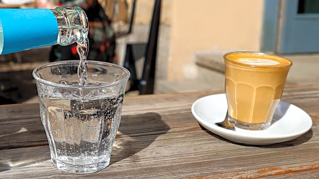 Why Coffee In Italy Often Comes With A Shot Of Seltzer Water On The Side