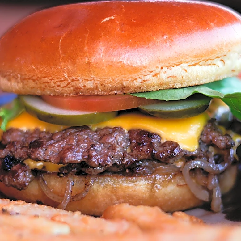 This Largely Forgotten Burger Chain Drew Crowds For Its Unlimited Toppings Bar