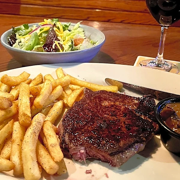 What Outback Steakhouse Uses To Get Its Steaks So Flavorful (It's Not Beef Tallow)
