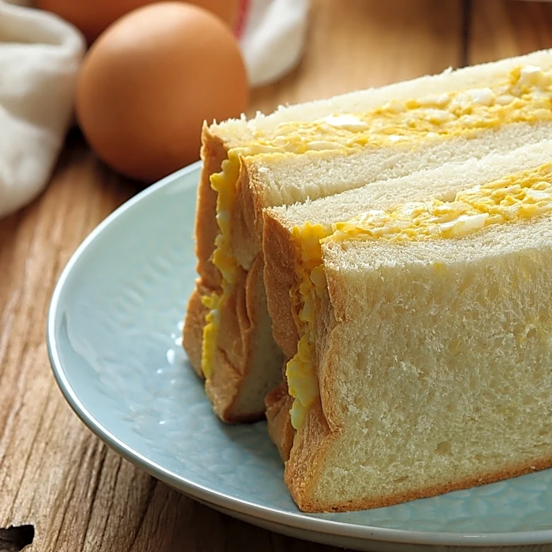 This Popular Egg Sandwich From The 1900s Came With An Odd Pairing