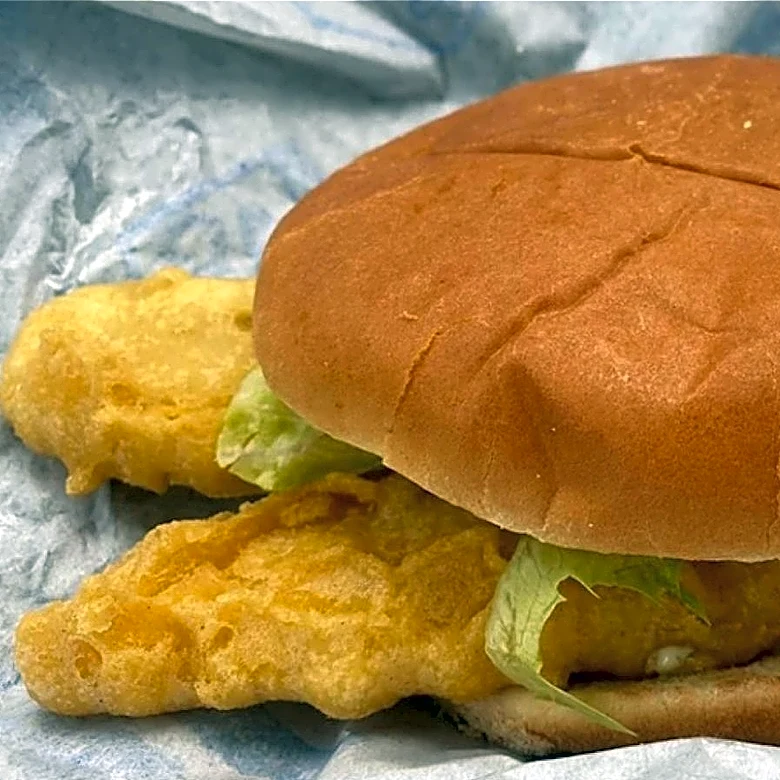 This Overlooked Seafood Chain Serves A Seriously Massive Fish Sandwich
