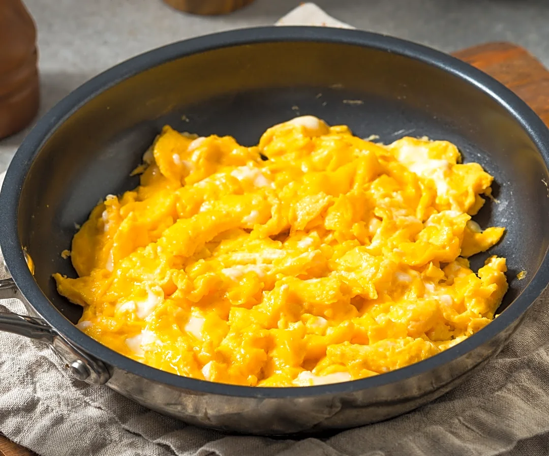 This Canned Pantry Staple Is The Key To More Flavorful Scrambled Eggs