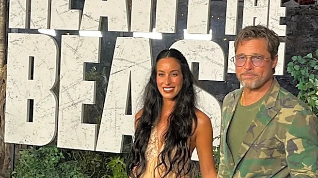 Brad Pitt, wearing all-camo suit, appears at Nashville-area 'Heart of the Beast' premiere