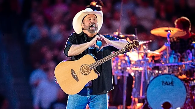 Garth Brooks and Trisha Yearwood signed guitar up for auction