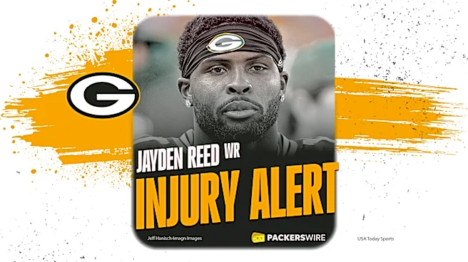 Packers WR Jayden Reed carted off with injury on second play vs. Jets