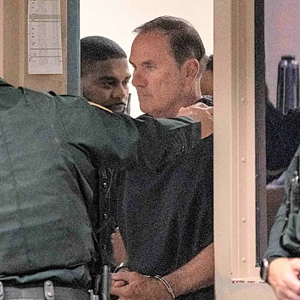 Suspended clerk Mike Caruso in court after child molestation arrest