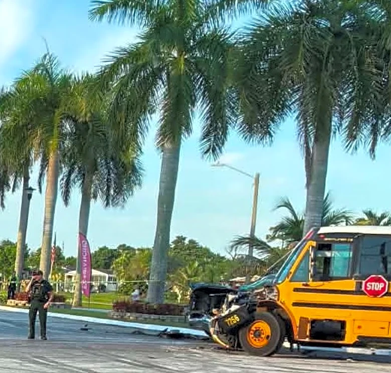 School bus crashes, rescuers use 'jaws of life' to free 4 from truck