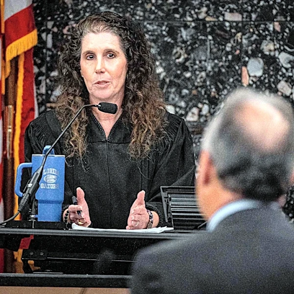 Judge ignores teen's plea to spare her sex-offending coach from prison