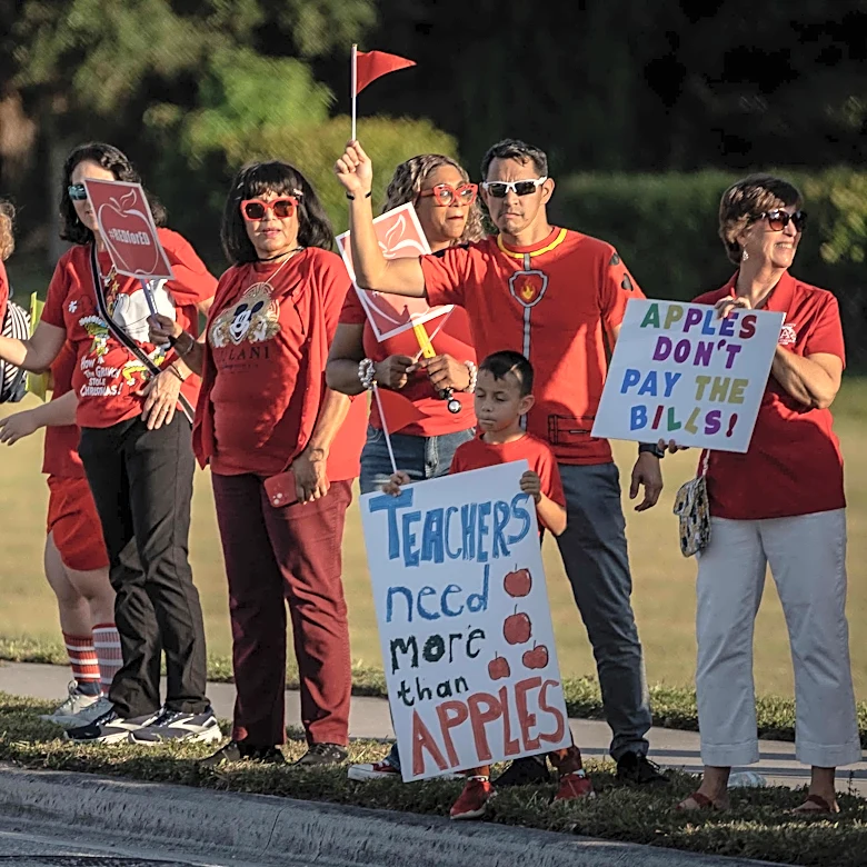 Schools cut 1,200 positions, seeks salary freeze for all employees