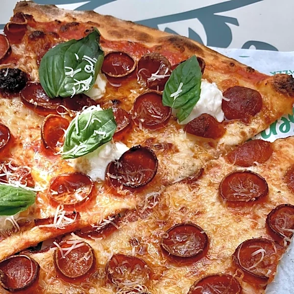 Is new pizza-by-the-slice joint at The Gardens Mall worth the trip?