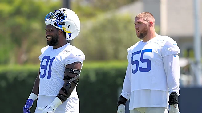Which Rams player will lose playing time with Aaron Donald back?