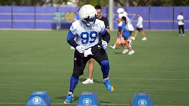 Jaxson Dart excited to possibly share field with 'unbelievable' Aaron Donald