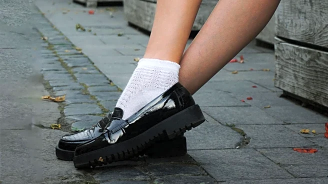Doechii Showcases Preppy Style with Miu Miu Penny Loafers at Outside Lands Festival