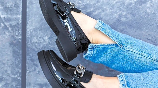 Cara Delevingne Showcases Topshop's London Comeback with Ruched Leather Loafers