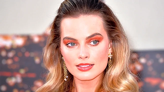 Margot Robbie Embraces Corseted Minidress for Film Photocall in Los Angeles