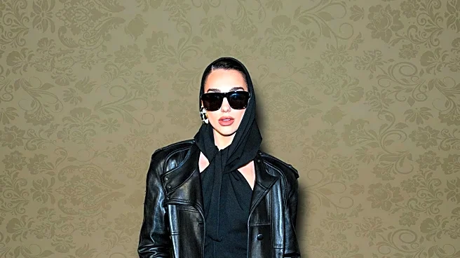 Zoë Kravitz Showcases Saint Laurent's Minimalist Footwear During 'Caught Stealing' Press Tour