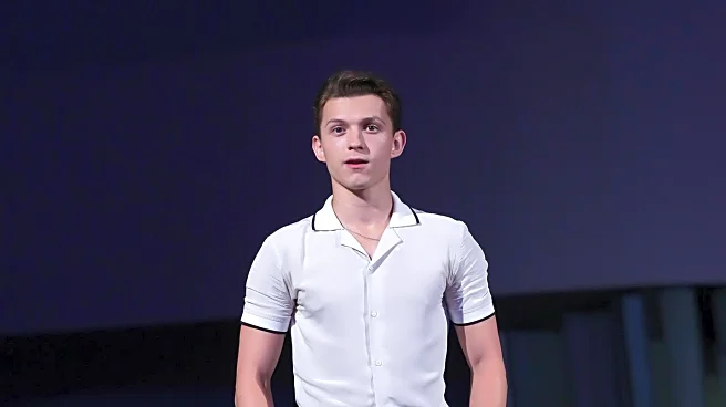 Tom Holland Discusses Fitness and Fragrance at Prada Launch