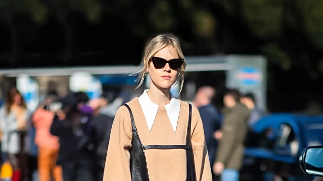 Flat Knee-High Boots Trend Gains Popularity in New York Street Style