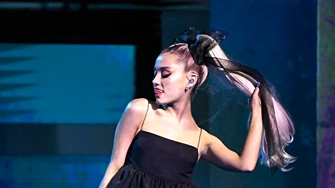 Ariana Grande Returns to Brunette for 'Wicked' Press Tour