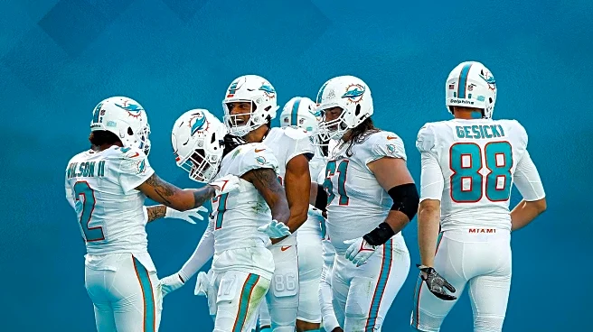 Dolphins Coaches Celebrate Halloween with Skeleton Costumes at TNF