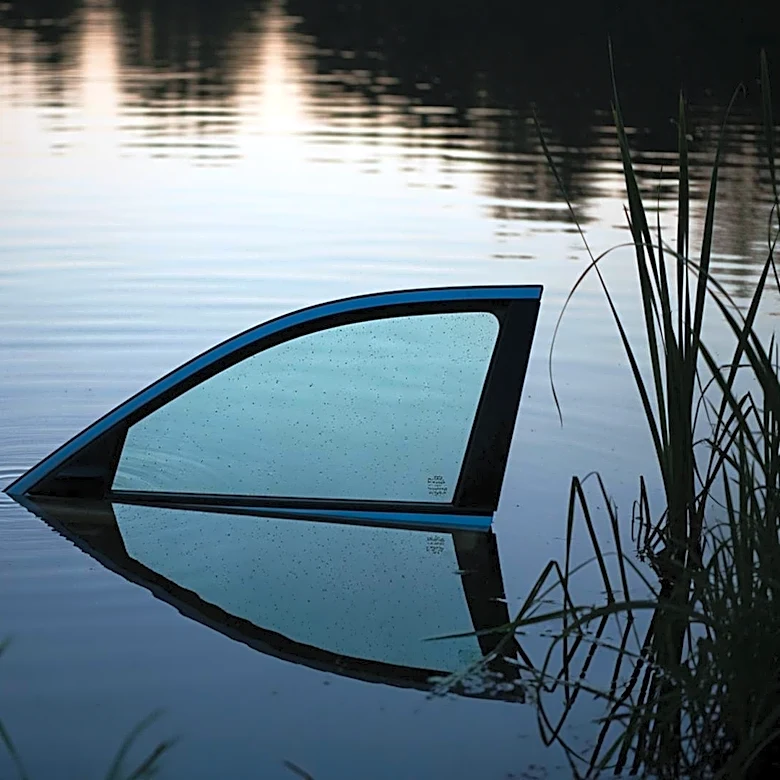 Officer Rescues Woman from Sinking Car in Fayette County Pond