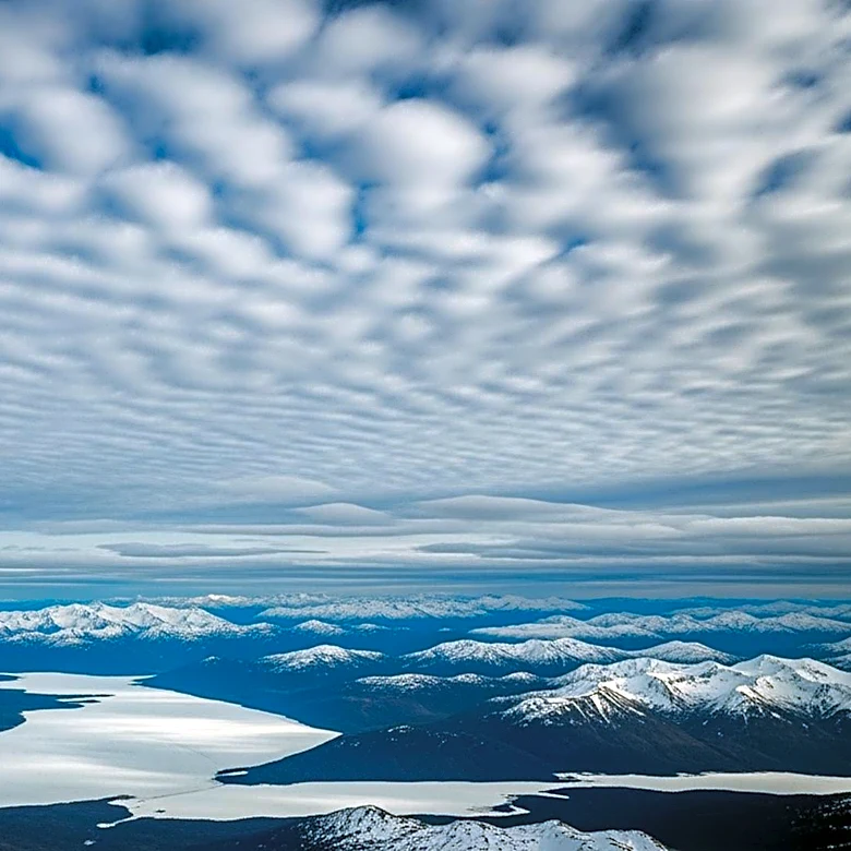 NASA Observes Winter's End in Alaska Through Striking Cloud Formations