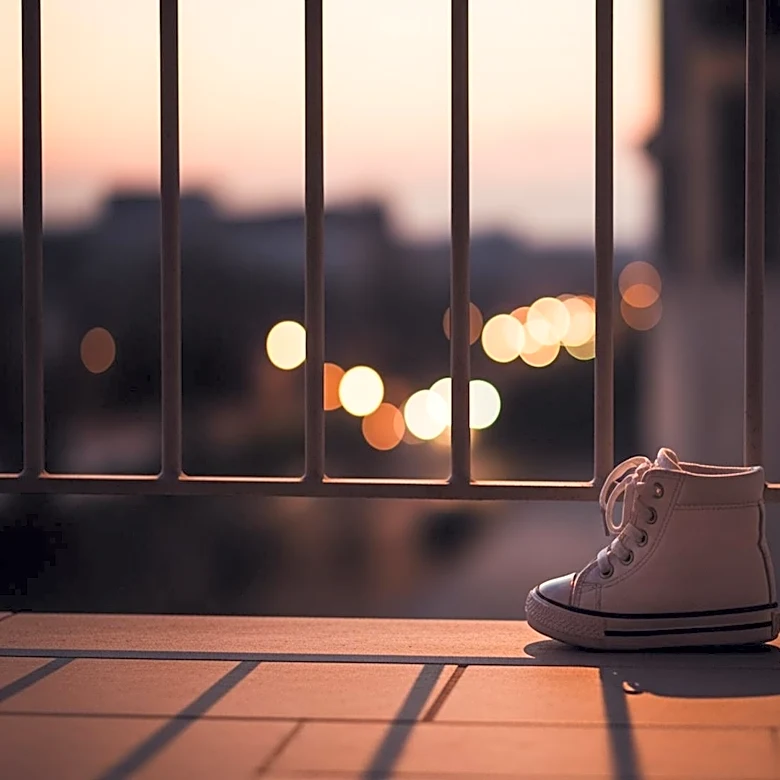 Toddler Survives Fall from Balcony After Being Left Alone by Father