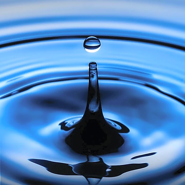 Reservoir Computing Advances with Fluid Dynamics for Energy-Efficient Processing