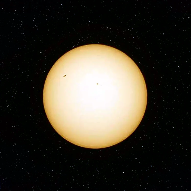 Astrophotographer Captures Stunning Image of ISS and Venus in Daylight